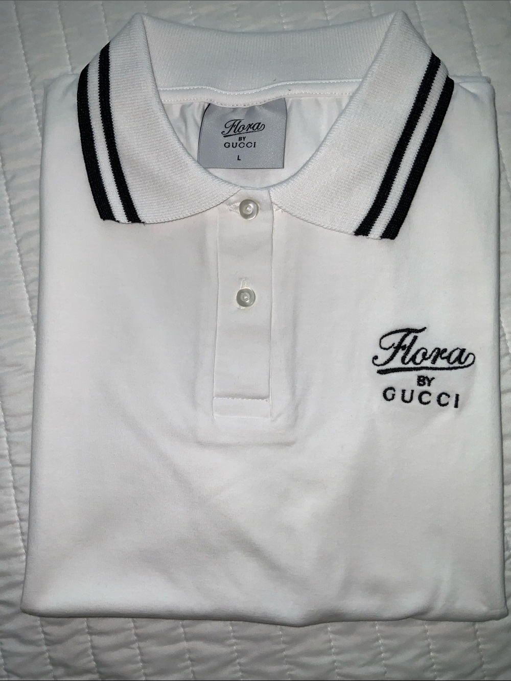 Women’s Gucci Flora White Polo Black Trim Short Sleeve promotional T-shirt. L